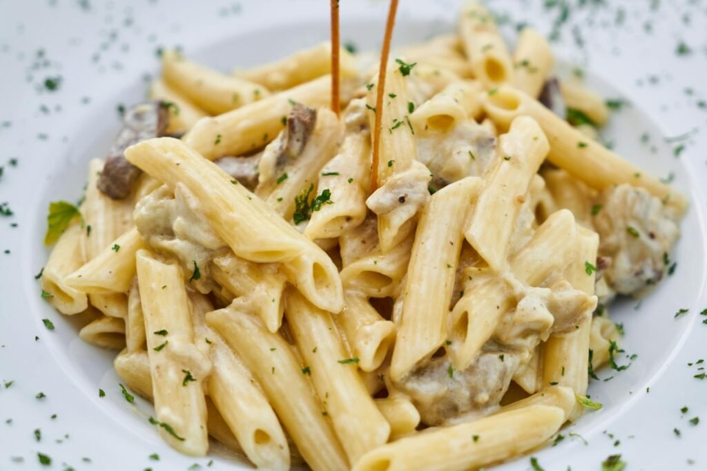 Creamy mushroom and lentil pasta with toasted breadcrumb topping