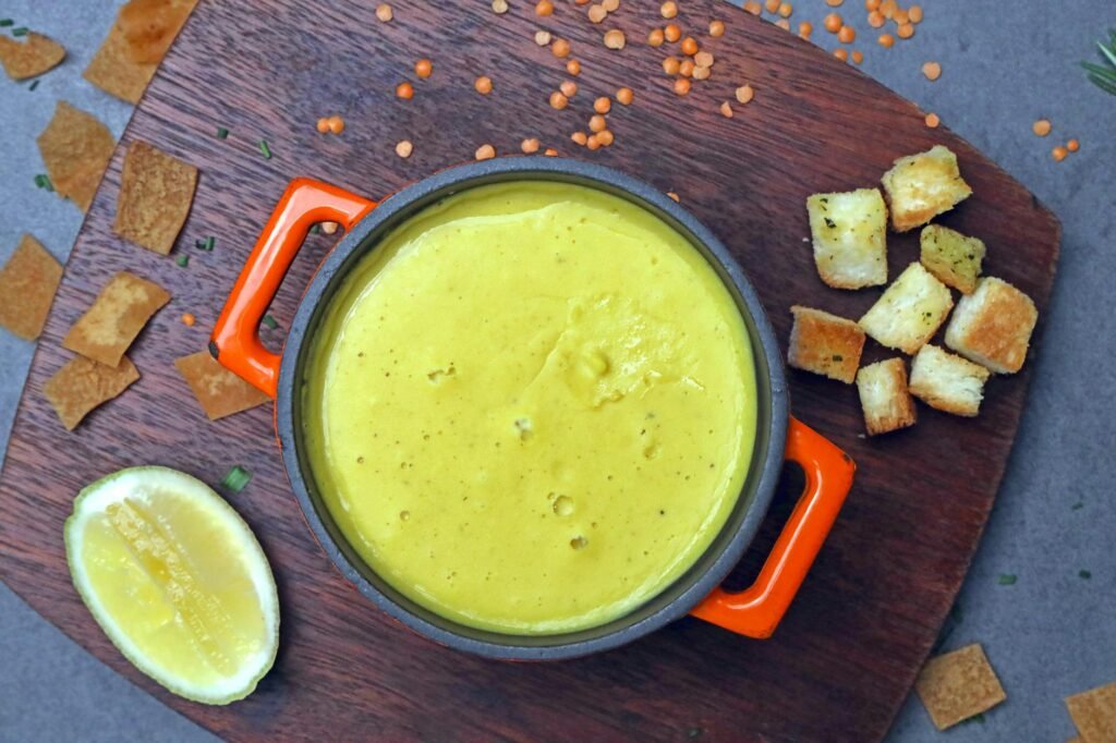 Lentil soup topped with lemon and toasted breadcrumbs