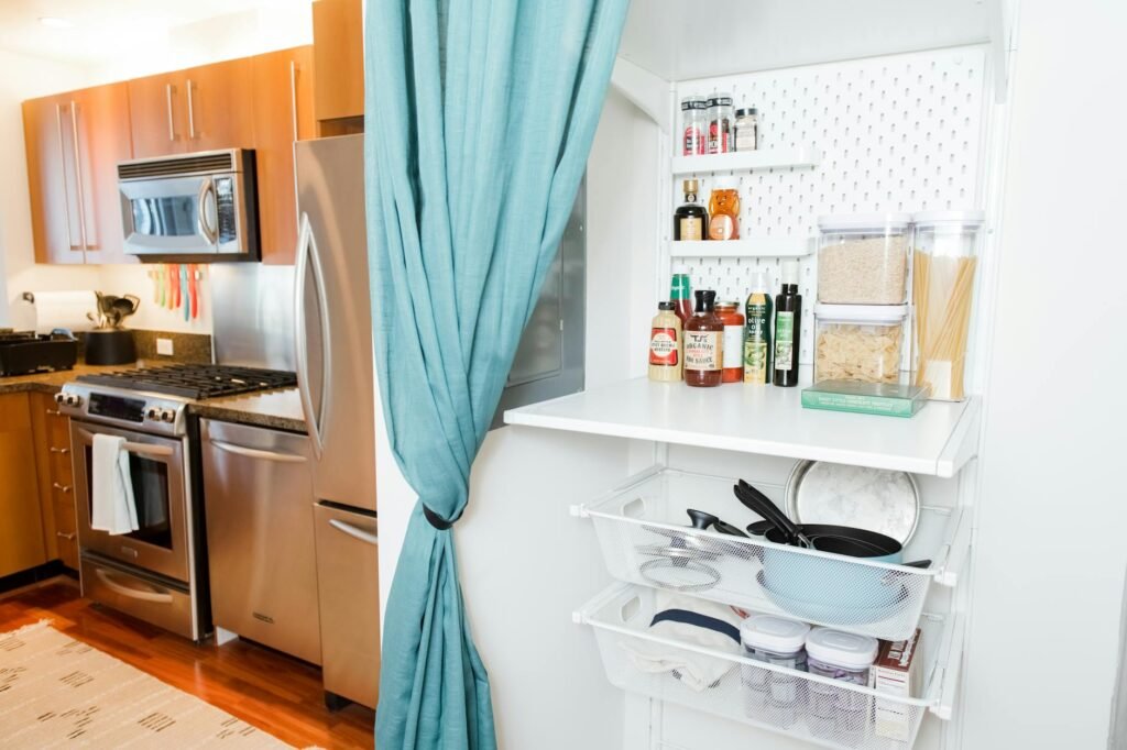 A freezer and pantry stocked with frozen vegetables, beans, grains, and soup