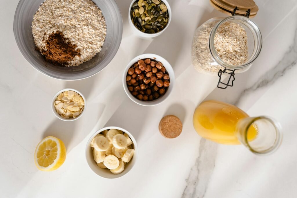 Meal-prepped vegan breakfasts in containers, including burritos and baked oatmeal